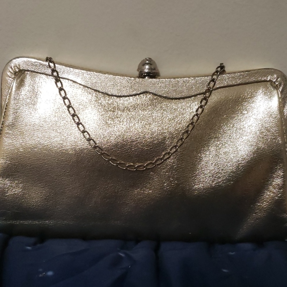 A  shimmering gold handbag